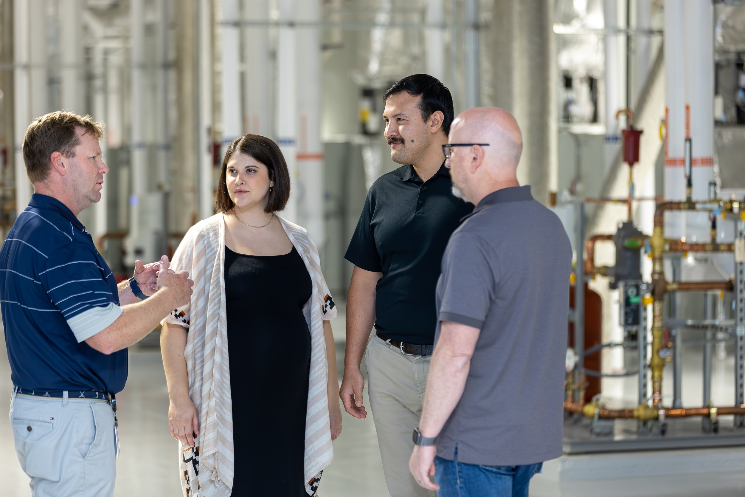   Left to right: Bryan Homes (Andelyn), Rehgan Bleile (AlignAI), Nick Woo (AlignAI), Scott Brown (Andelyn) | Credit: Autumn Theodore Photography  