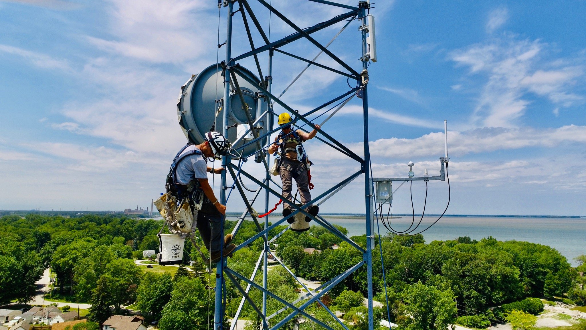    Tower climbers install low power, wide area networking telecommunications devices in Cleveland (Great Lakes Outreach Media)  